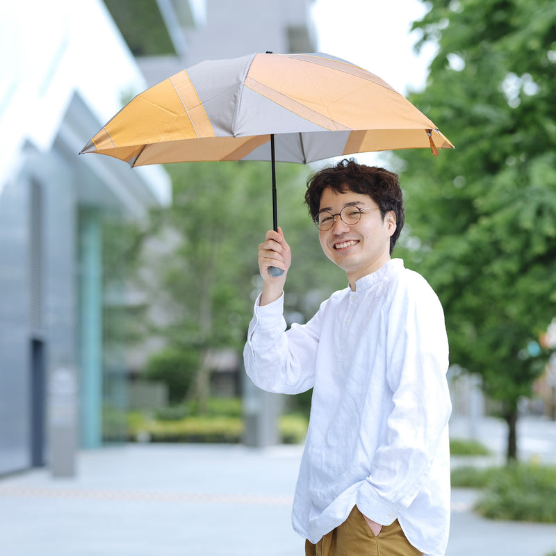 晴雨兼用　レディース　メンズ　repel.　Portable umbrella 　Orange　折りたたみ傘　使用イメージ